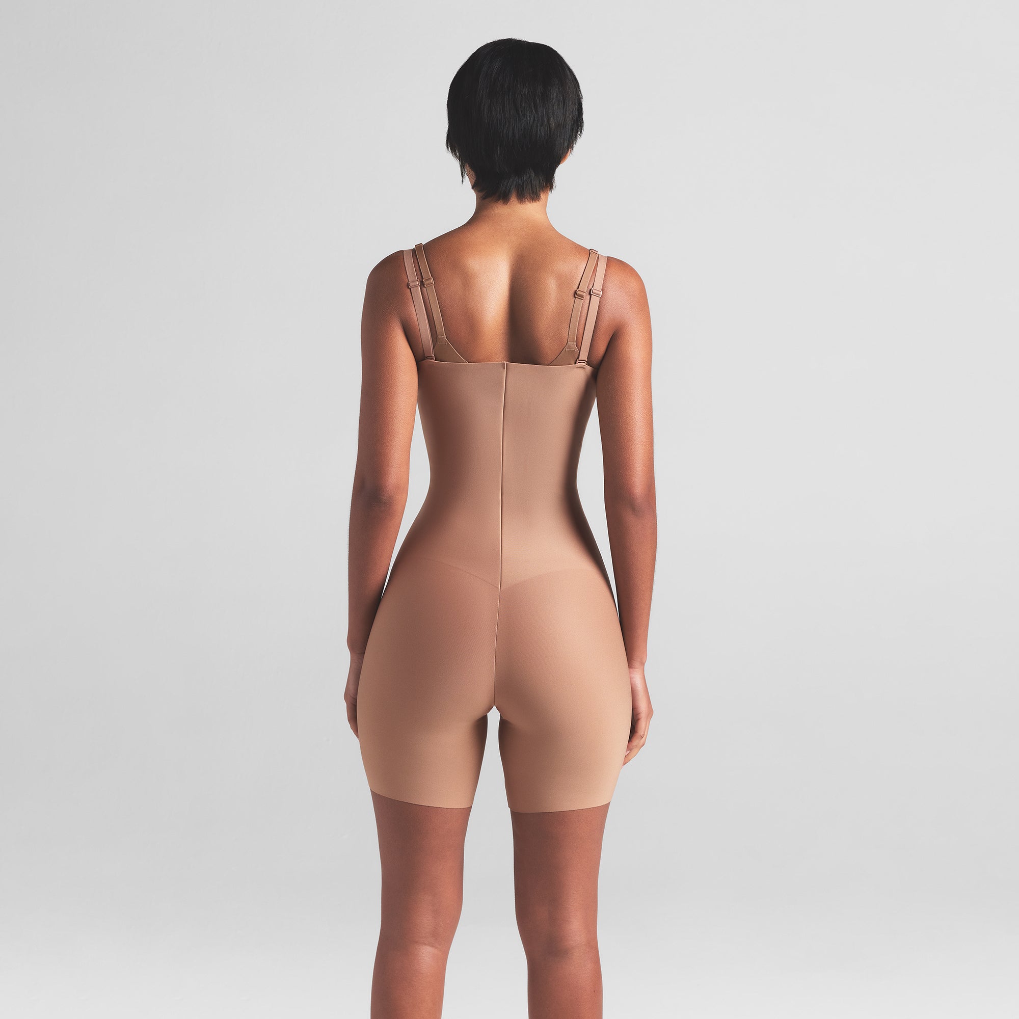 skims body core sculpt open bust mid thigh bodysuit skims body core sculpt open bust mid thigh bodysuit