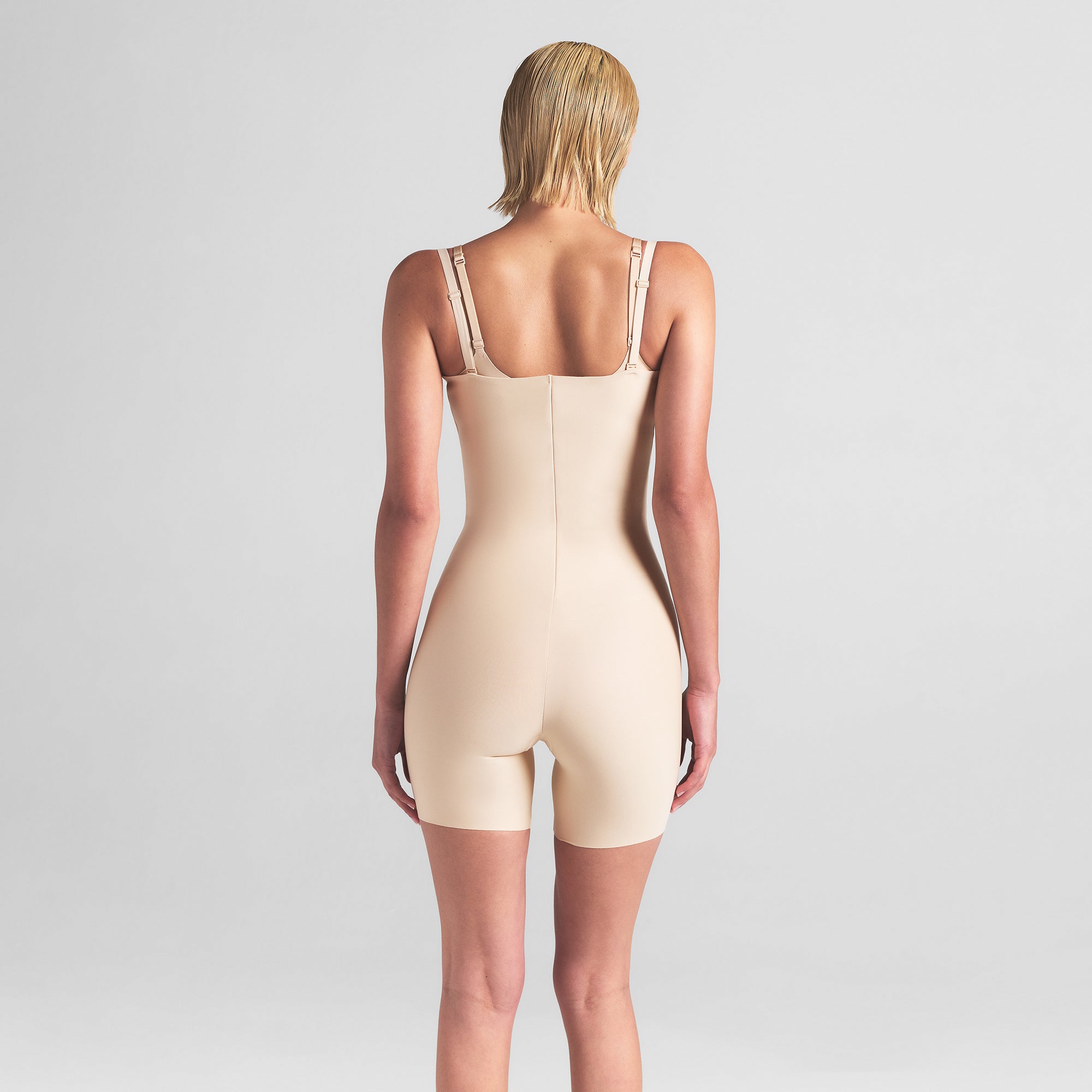 skims body core sculpt open bust mid thigh bodysuit skims body core sculpt open bust mid thigh bodysuit