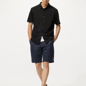 stretch slim shorts | 9"